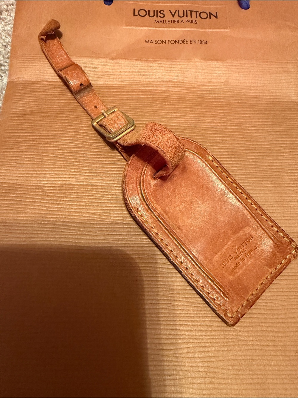 Louis Vuitton Leather Luggage Tag in Tan